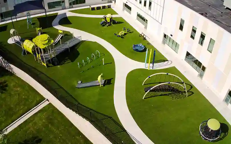 image of SYNLawn artificial grass at KC BE Smith Childrens Center Playground 01